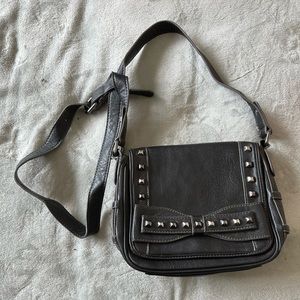 Black stubbed crossbody Jessica Simpson purse worn but in excellent condition